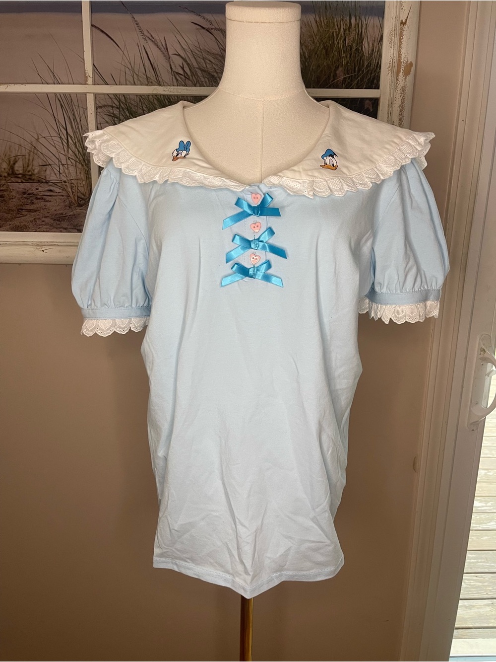 Light Blue Puff Sleeve Top with Donald & Daisy Duck Collar and Ribbon Accents